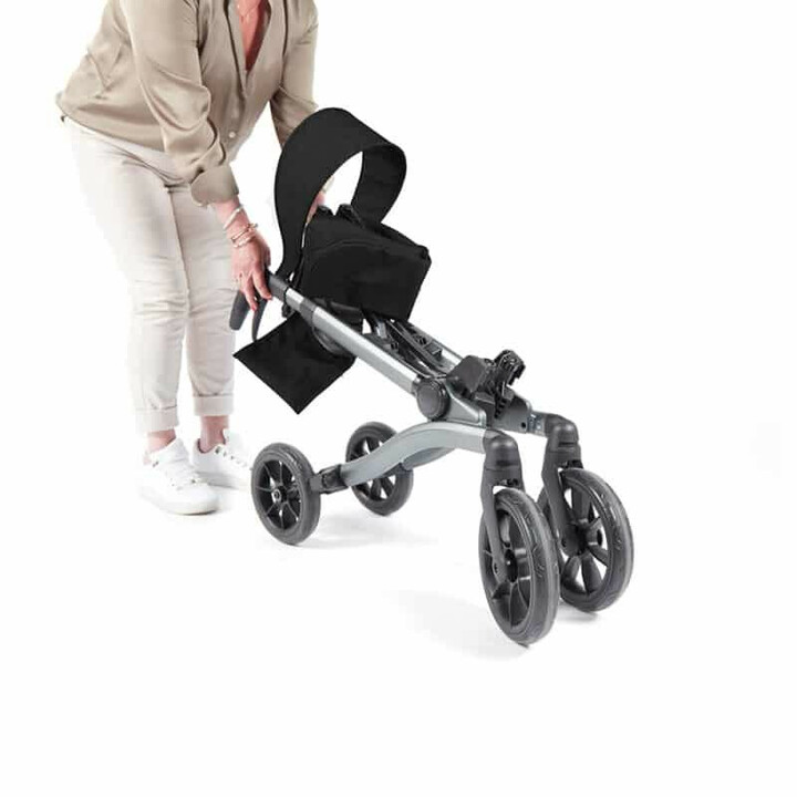 Svart rollator, ergonomisk och kompakt, ergonominen ja kompakti