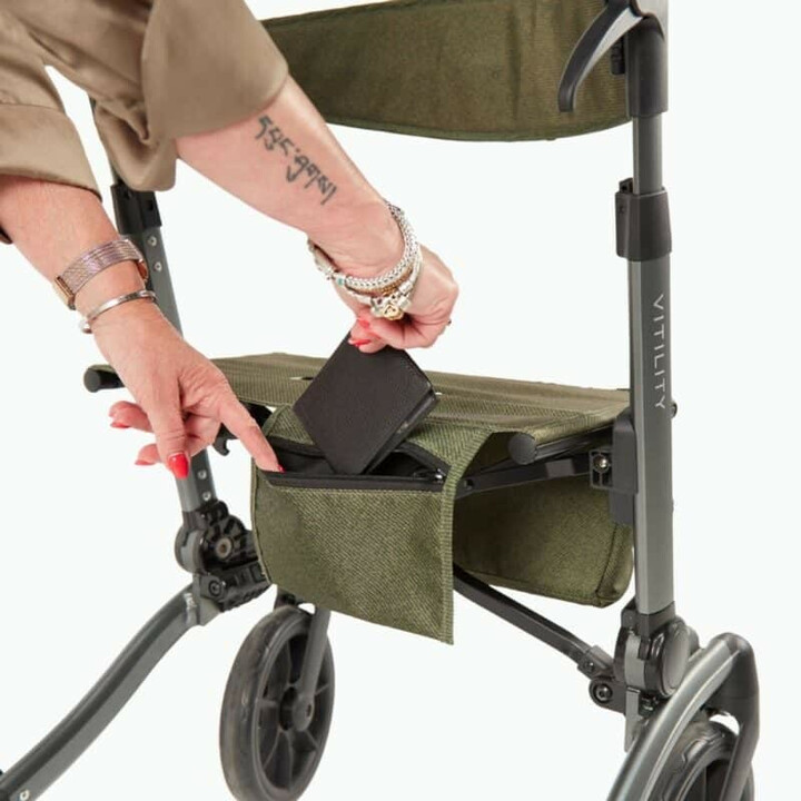 Grön rollator, ergonomisk och kompakt, ergonominen ja kompakti