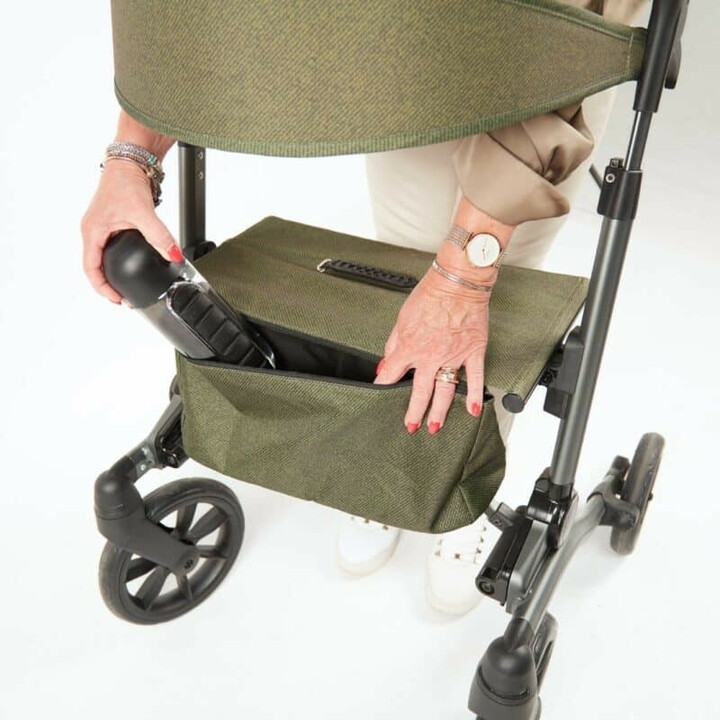 Grön rollator, ergonomisk och kompakt, ergonominen ja kompakti