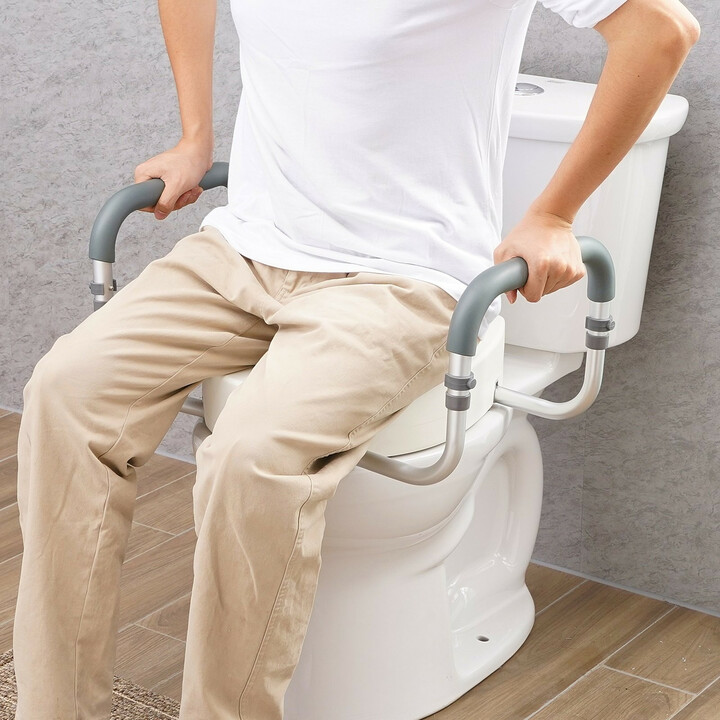 Korotettu wc-istuin käsinojilla, 88,9 mm korotus, alumiini/muovi, kantavuus 136 kg, FBL760599